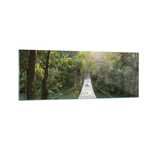 Glasbild - Bild auf glas - Eine Hängebrücke in einem tropischen Wald, beleuchtet vom Sonnenlicht. - 140x50cm - Über das azurblaue Wasser zum azurblauen Wald - Moderne Wanddekoration für Wohnzimmer und Schlafzimmer ARTTOR