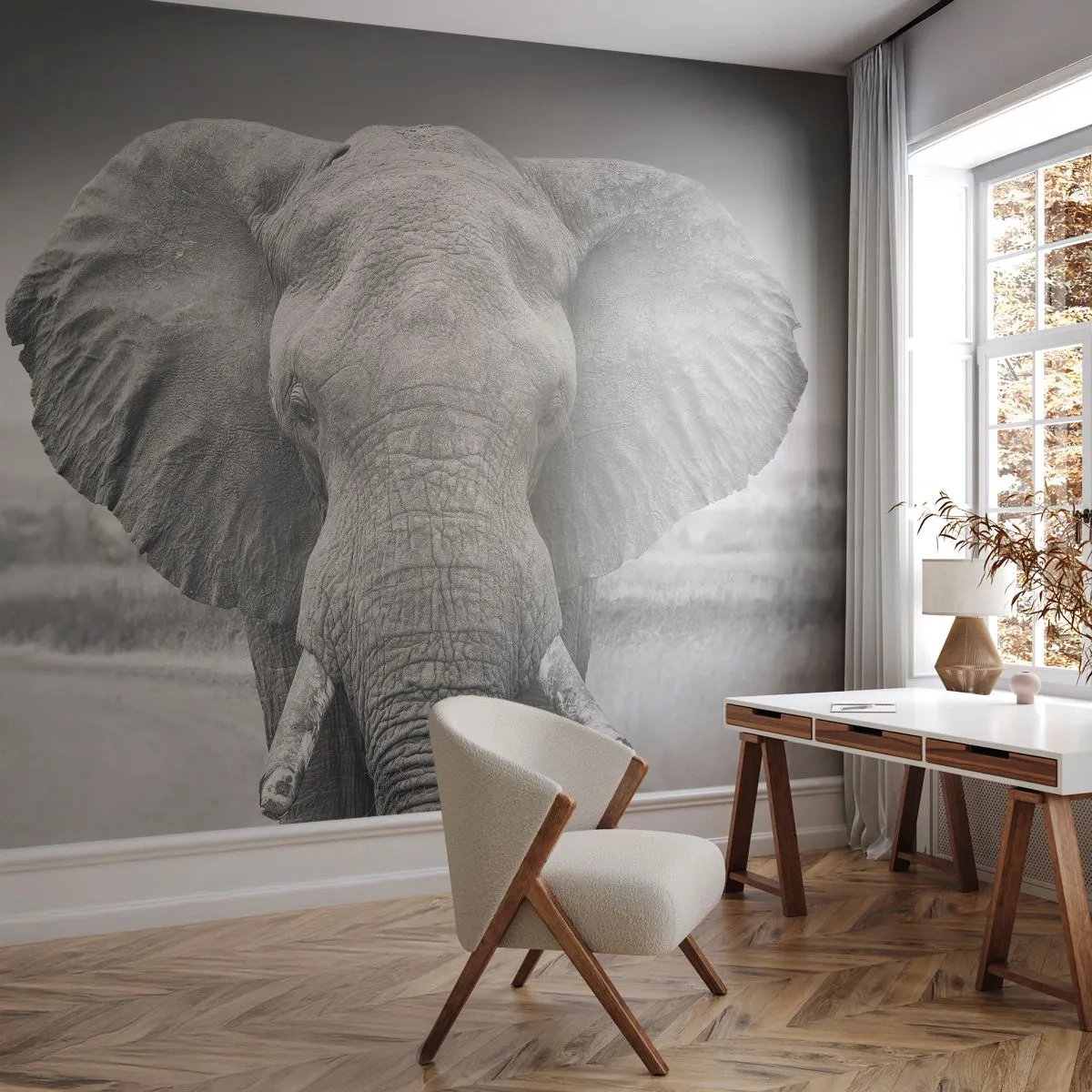 Fototapete Premium Sand - Schwarz-Weiß-Porträt eines afrikanischen Elefanten vor Savannenhintergrund - 100x70cm - Willkommen in meiner Welt - Moderne Wanddekoration für Wohnzimmer und Schlafzimmer ARTTOR