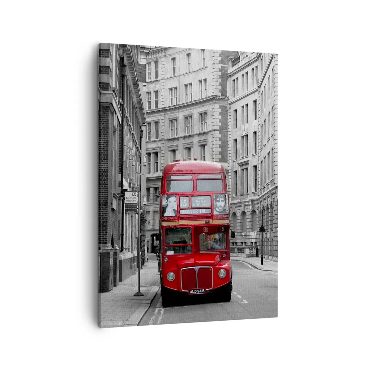 Bild auf Leinwand - Leinwandbild - Ein roter Bus vor einem Hintergrund aus schwarz-weißen Stadtgebäuden. - 50x70cm - Der Alltag muss nicht grau sein - Moderne Wanddekoration für Wohnzimmer und Schlafzimmer ARTTOR