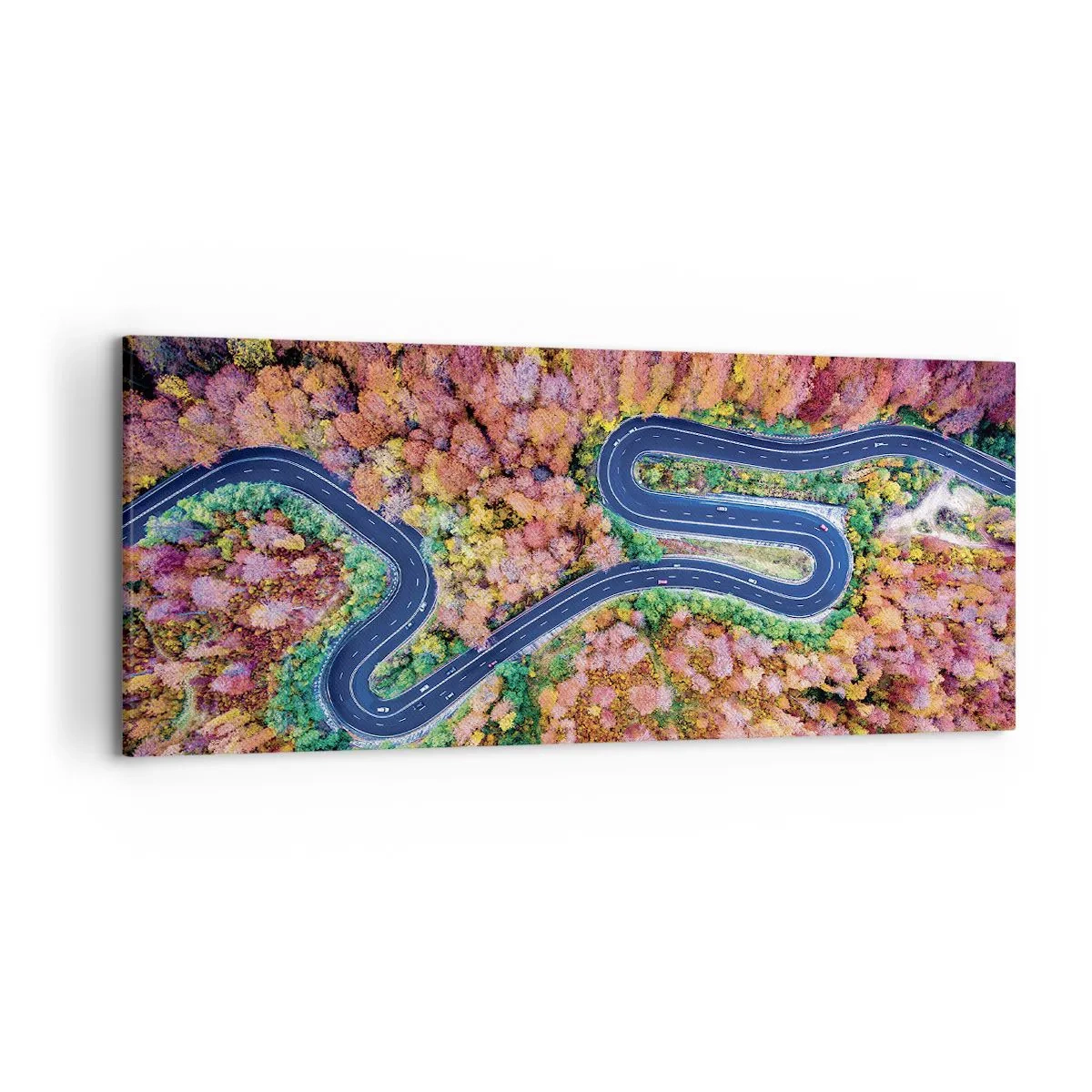 Bild auf Leinwand - Leinwandbild - Eine kurvenreiche Straße in einem herbstlichen Wald aus der Vogelperspektive gesehen - 120x50cm - Kurvenreicher Weg durch den Wald - Moderne Wanddekoration für Wohnzimmer und Schlafzimmer ARTTOR